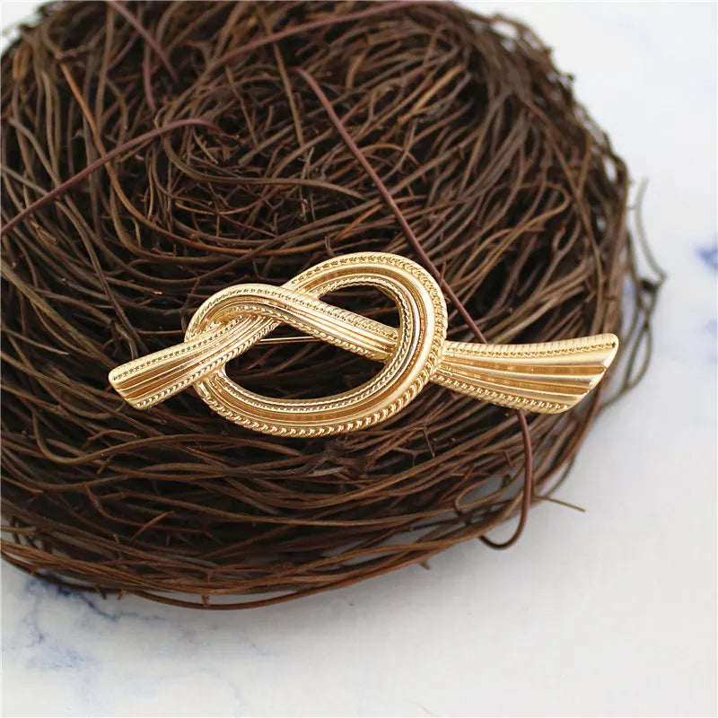 broche à chapeau vintage en or